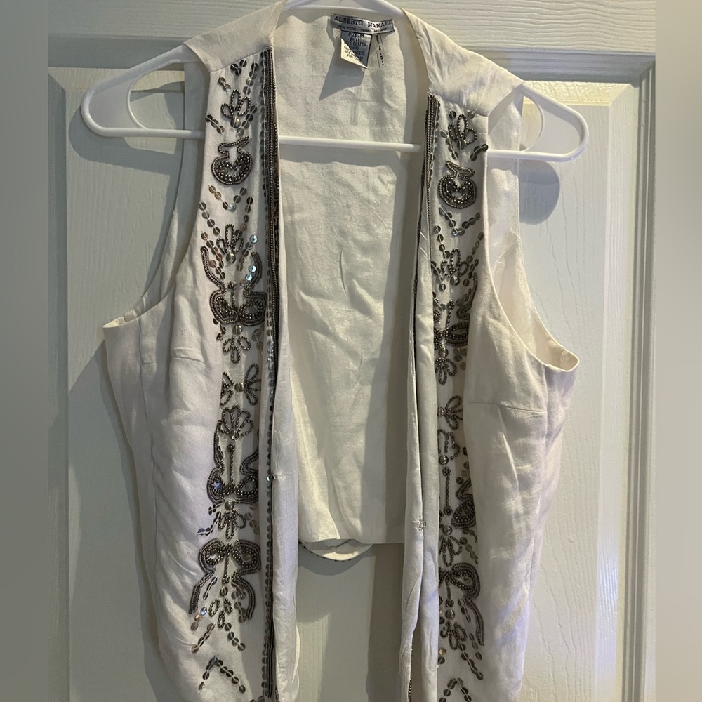 Beaded vest with double fabric layer in front and hook closure